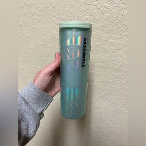 Used Starbucks green shimmer swirl plastic tumbler. Some damage on item